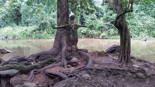 THIS IMAGE IS BESIDE THE OSUN RIVER, OSUN IS THE GODDESS OF FERTILITY AND THE WATER IN THE RIVER IS SAID TO ENHANCE FERTILITY IN WOMEN