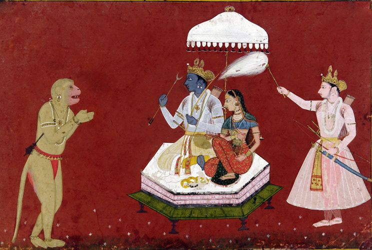 Rama seated with Sita, fanned by Lakshmana, while Hanuman pays his respects