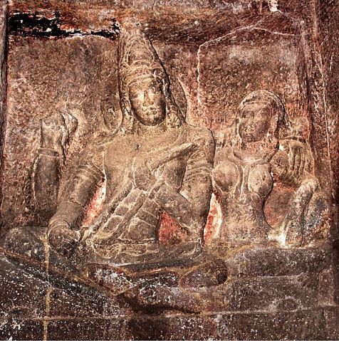 Siva playing a stick-zither vina for Parvati in Ellora Caves, image in side passage of Kailash temple (cave 16)