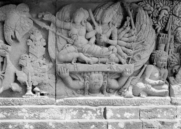 Ravana kidnapping Sita riding winged giant, while the Jatayu on the left tried to help her. 9th century Prambanan bas-relief at the temple dedicated to Shiva at Prambanan temple complex, Java, Indonesia