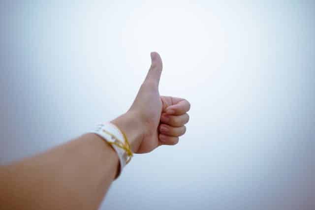 A girl doing thumbs up