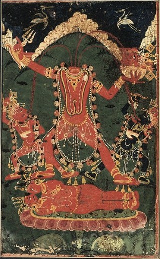 Chhinnamastā (also known as Vajrayogini among the Buddhists) is depicted with her severed head in the left arm, standing over the couple Kama and Rati, in a traditional posture. 
